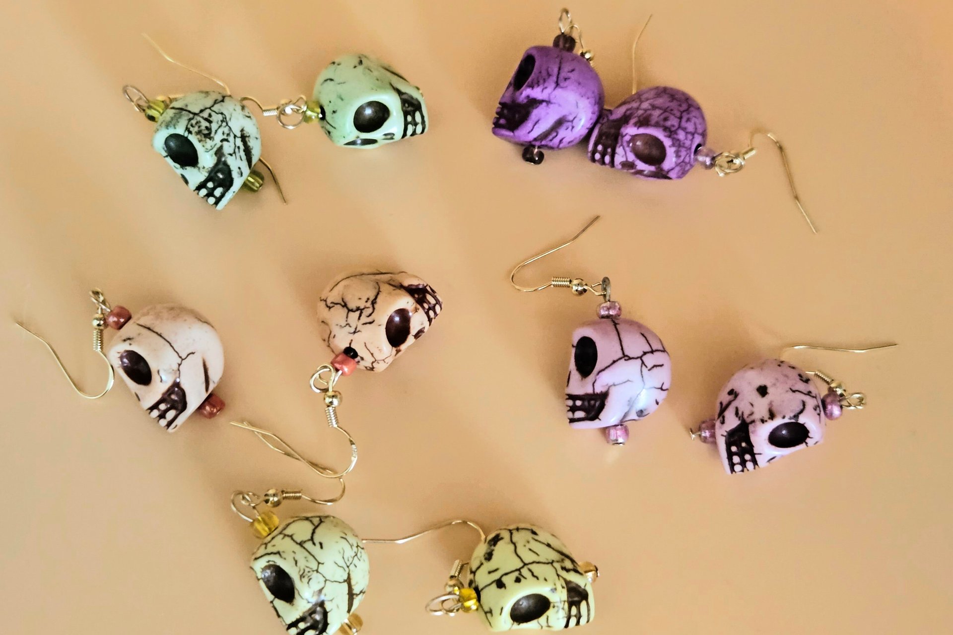 Ghostly Skull Earrings in five colors